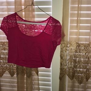 Pink crop top with lace back.